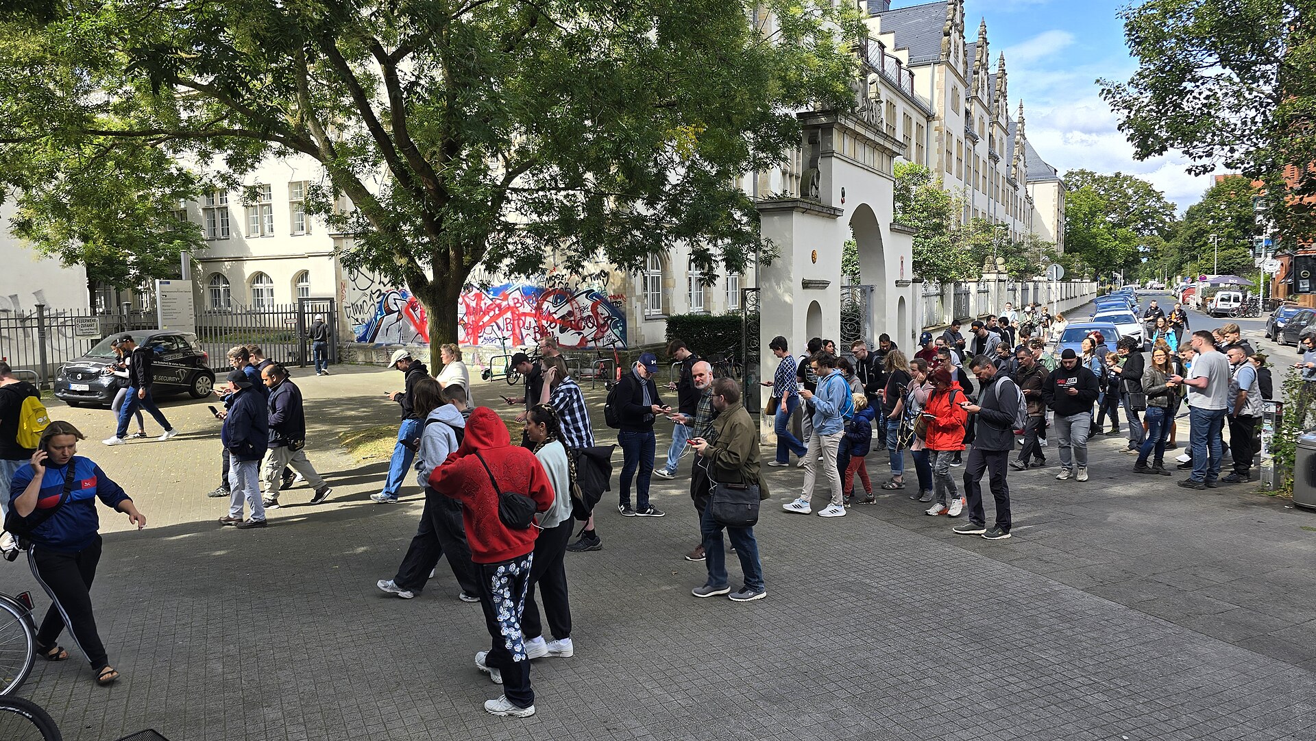 a bunch of germans enraptured by pokemon go